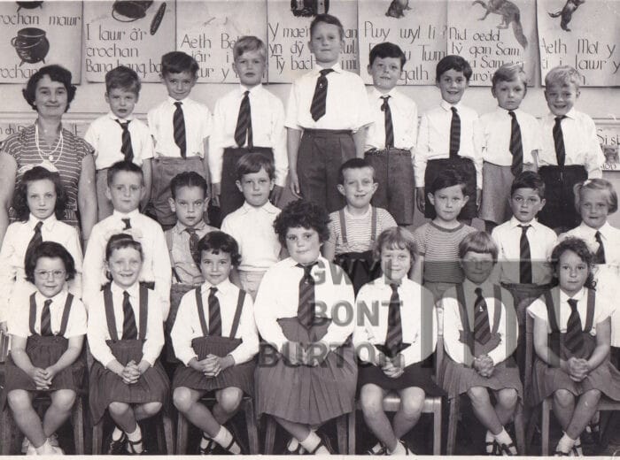 Pupils in School uniform in a black and white image