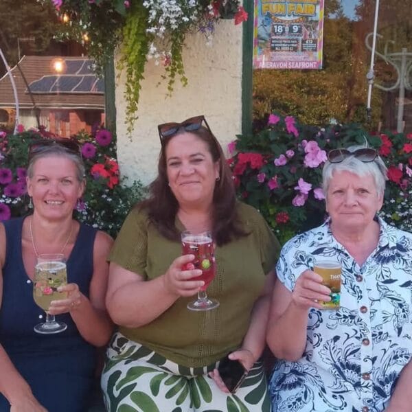 Ivor Emmanuel's family enjoying a drink.